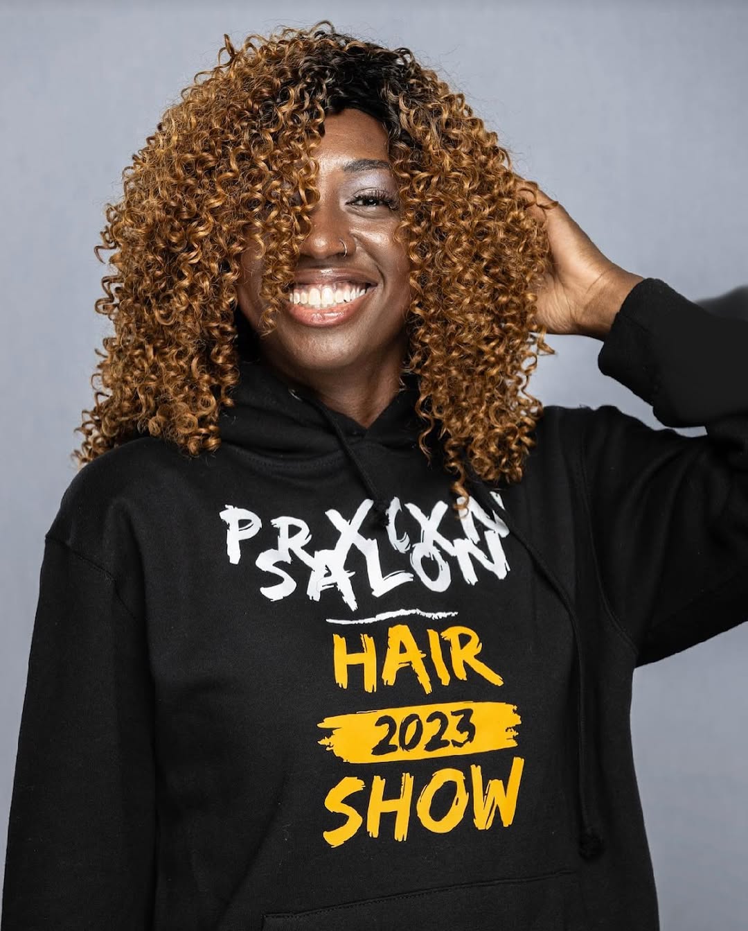 Voluminous defined caramel curls and natural hair care by La Salon in Pickering, Ontario