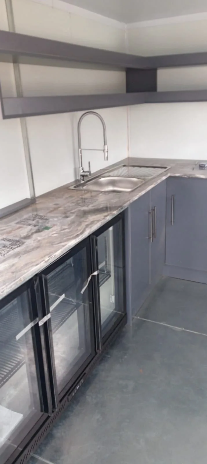Sink, worktop and fridge inside the Nom Bango mobile bar