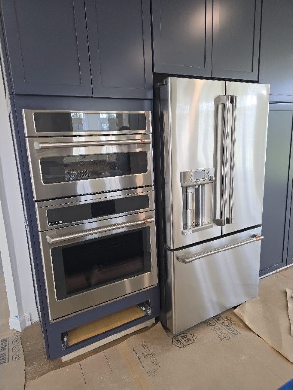 Custom installation of Café French-door refrigerator & double wall oven