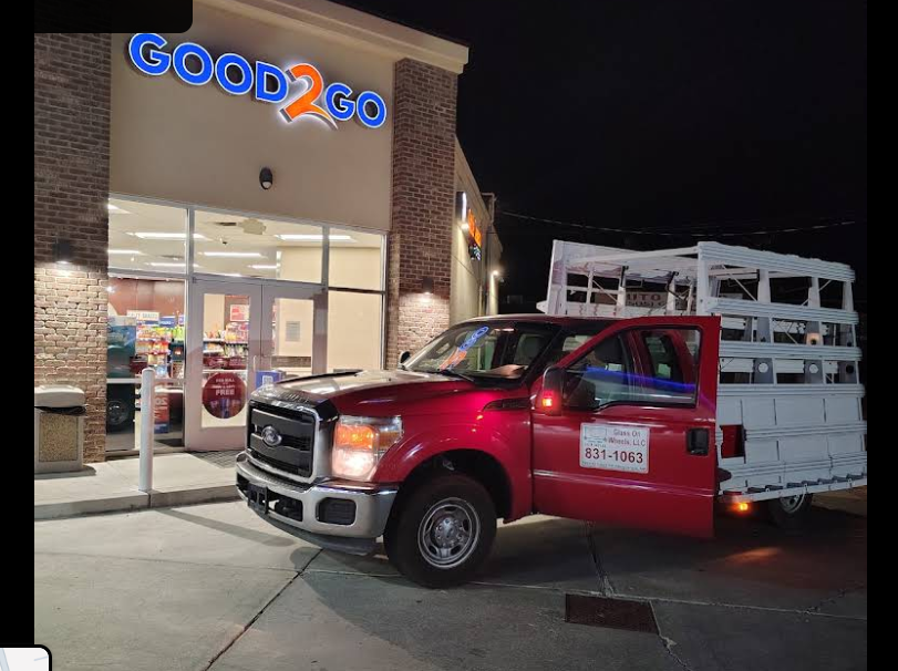 Glass on Wheels red service truck on night emergency commercial dispatch outside Good 2 Go
