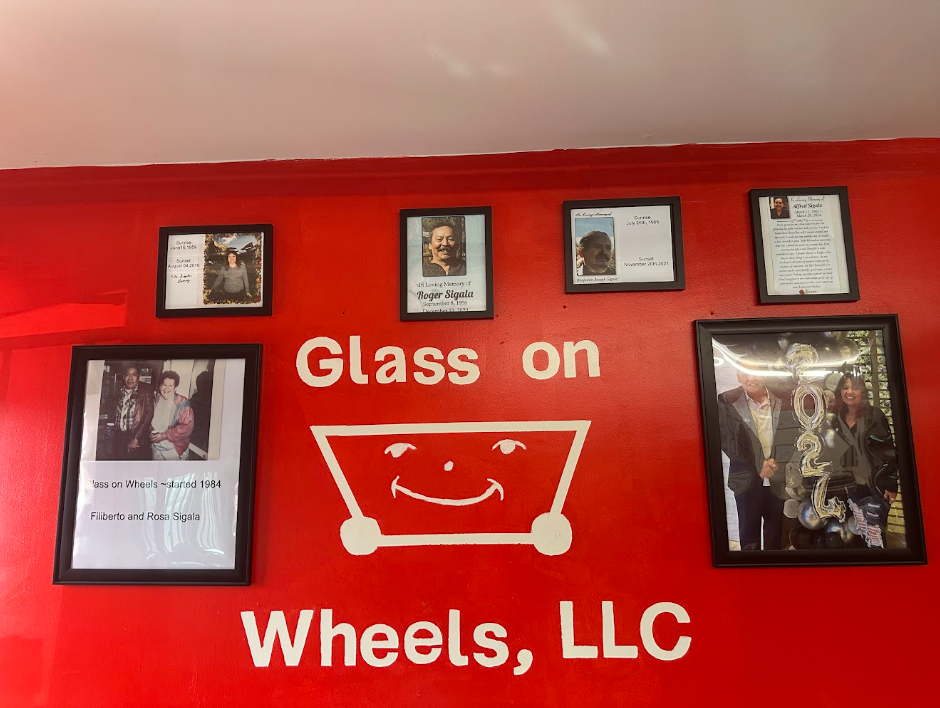 Glass on Wheels shop wall showing founders Filiberto and Rosa Sigala