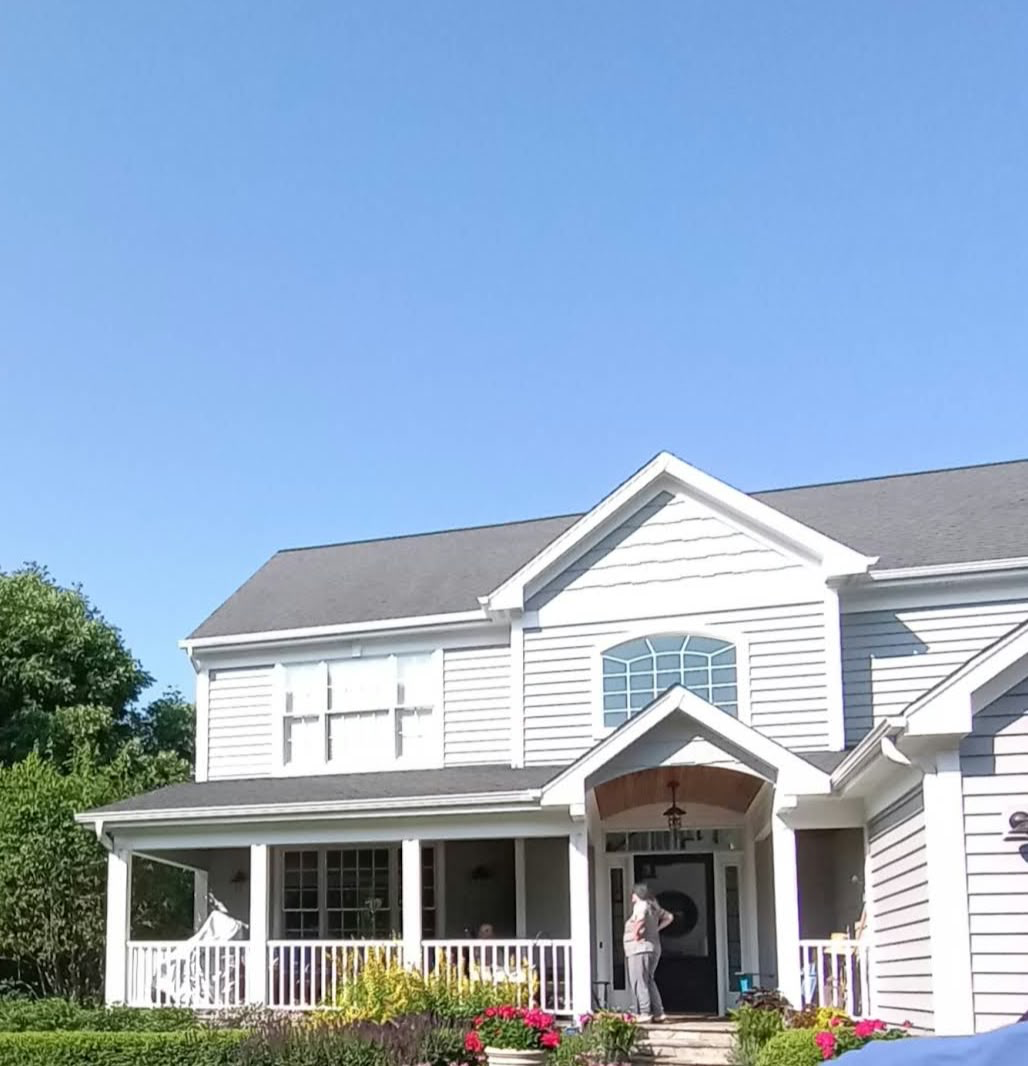 Suburban Two-Story Siding & Covered Porch