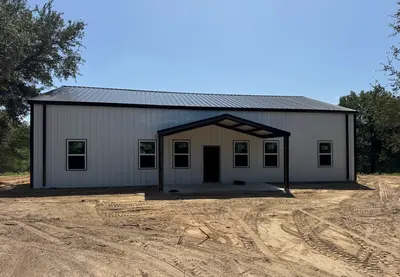 White Metal Building with Covered Porch