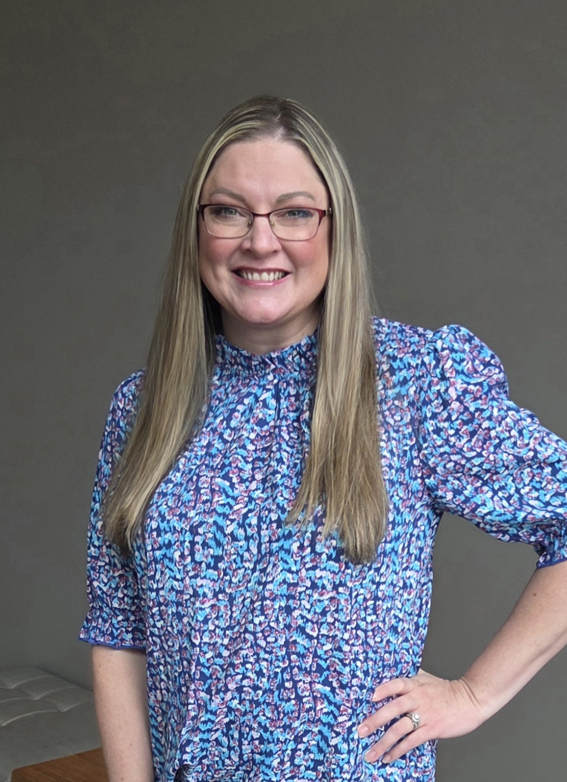 Professional portrait of Amber Renee Till, Serenity Builder and Lead Generation Strategist