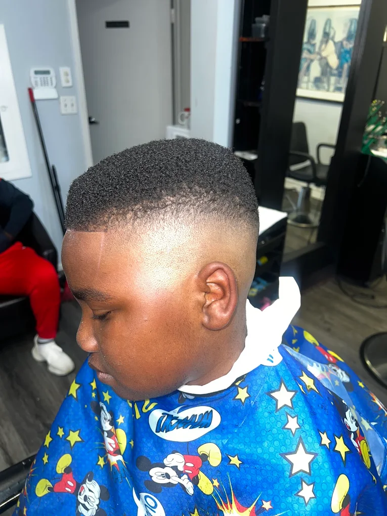 Flawless youth high bald fade with laser-sharp perimeter line up and smooth skin blend