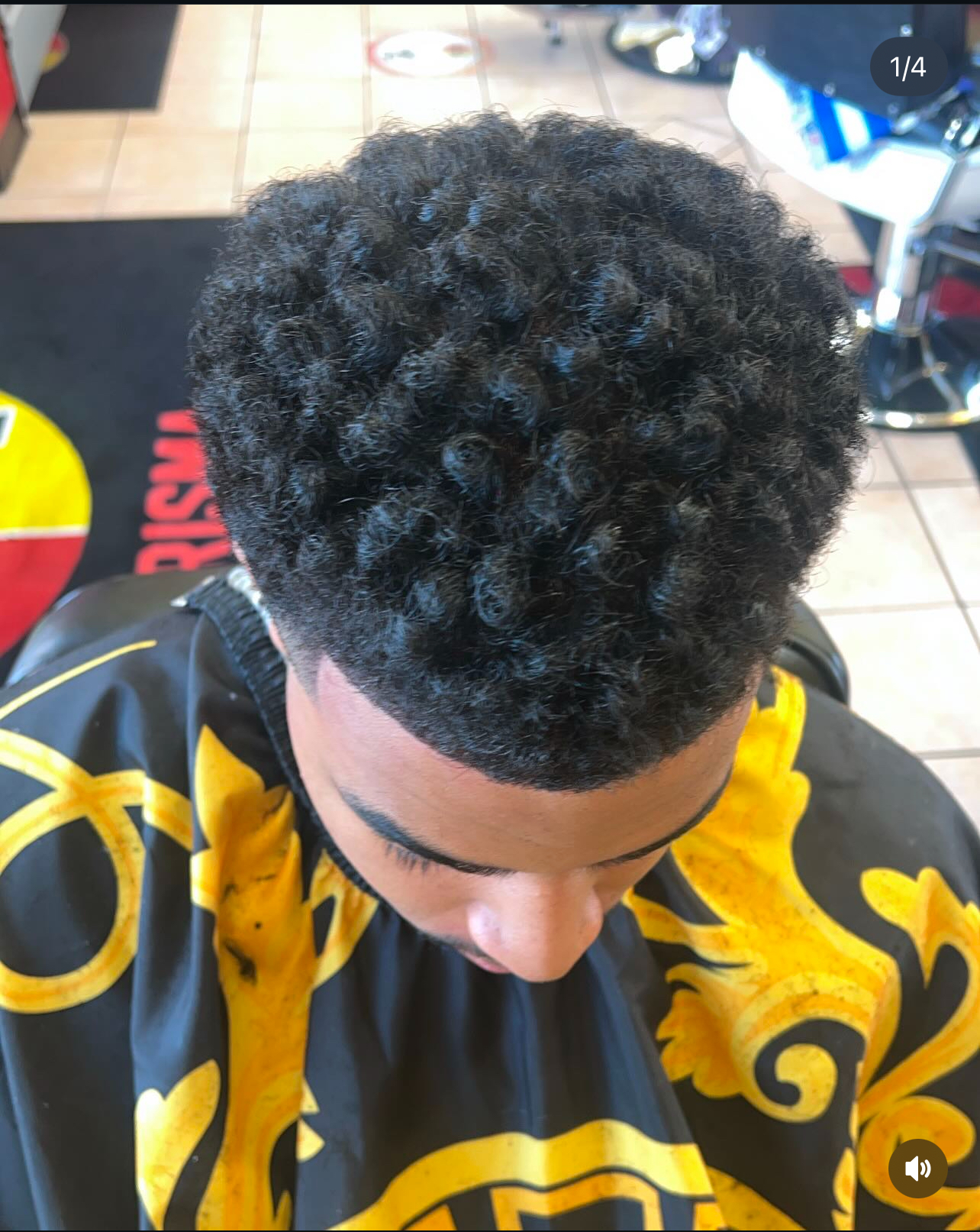 Defined curl twists with sharp razor forehead lineup and low temple fade at Image Barber Studio