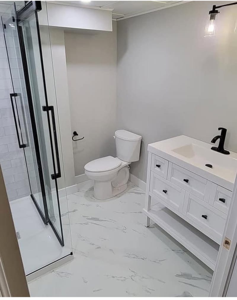 Modern White Vanity & Marble Tile Ensuite