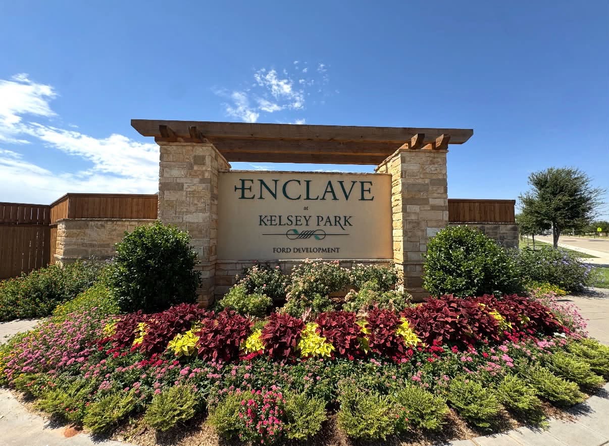 Lubbock, TX · Multi-tier annual flowerbed installation & custom stonework plantings