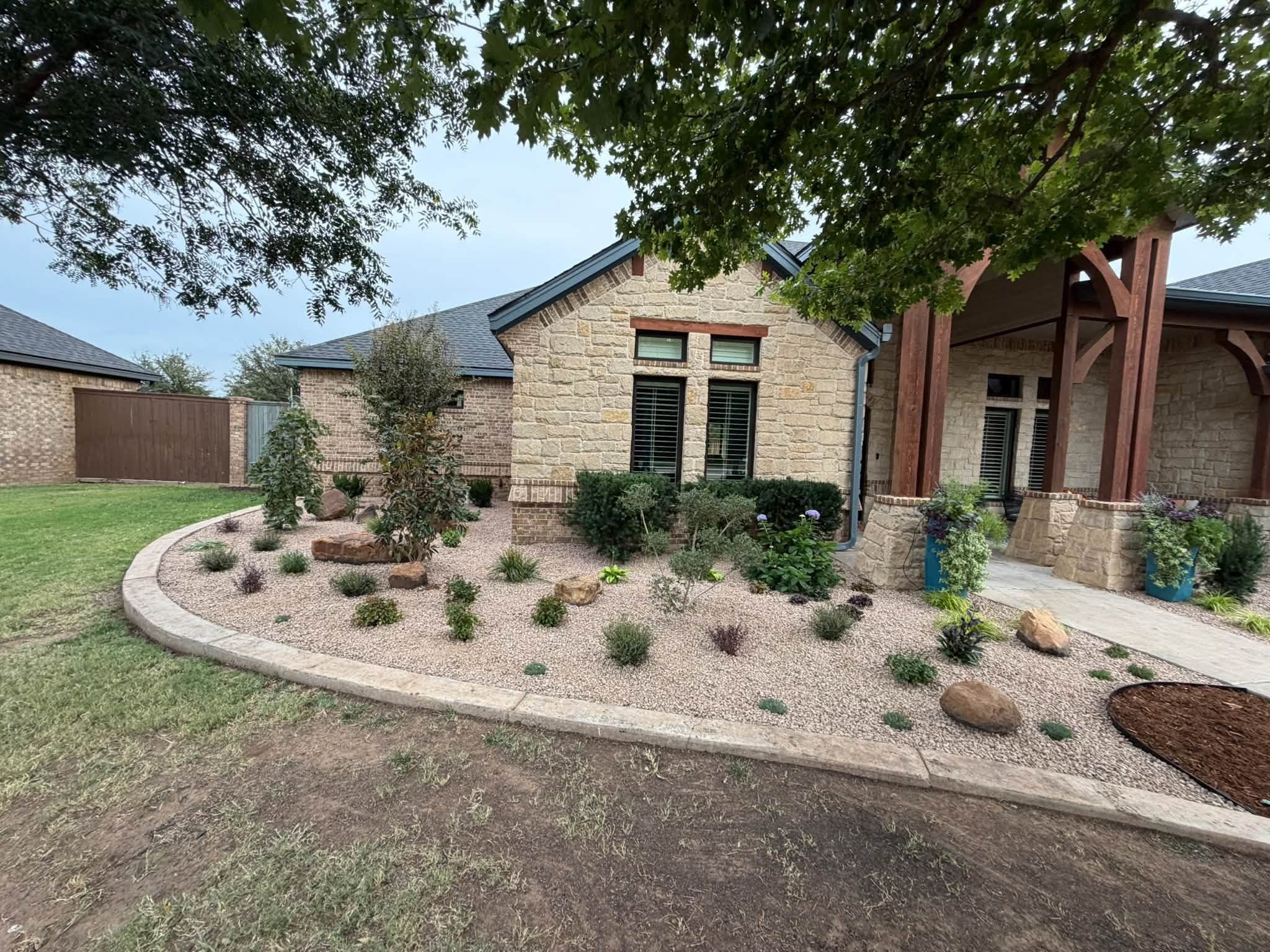 Residential estate · Custom border edging, desert gravel, native perennials & crepe myrtle