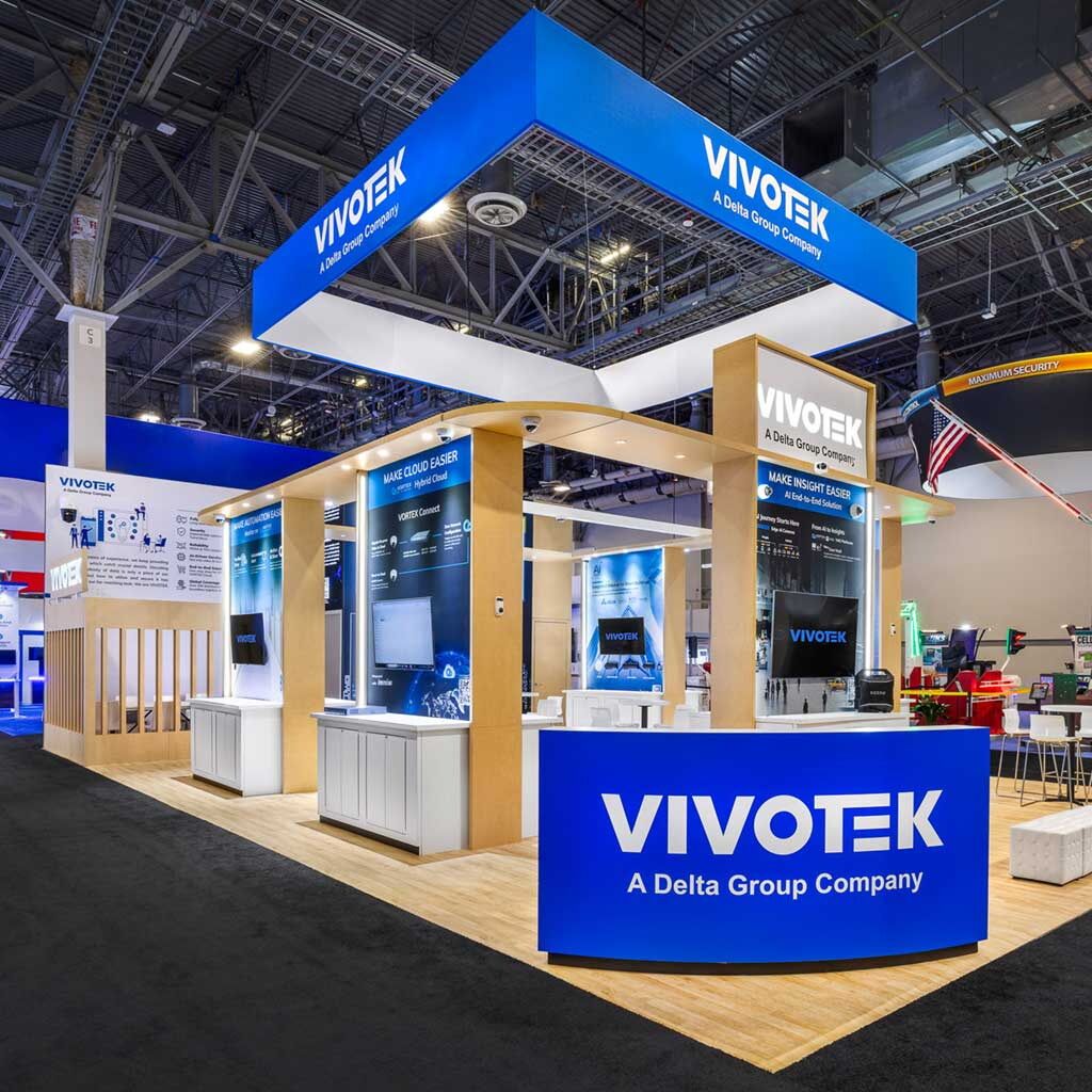 Vivotek custom trade show booth with curved reception desk and high-tech displays