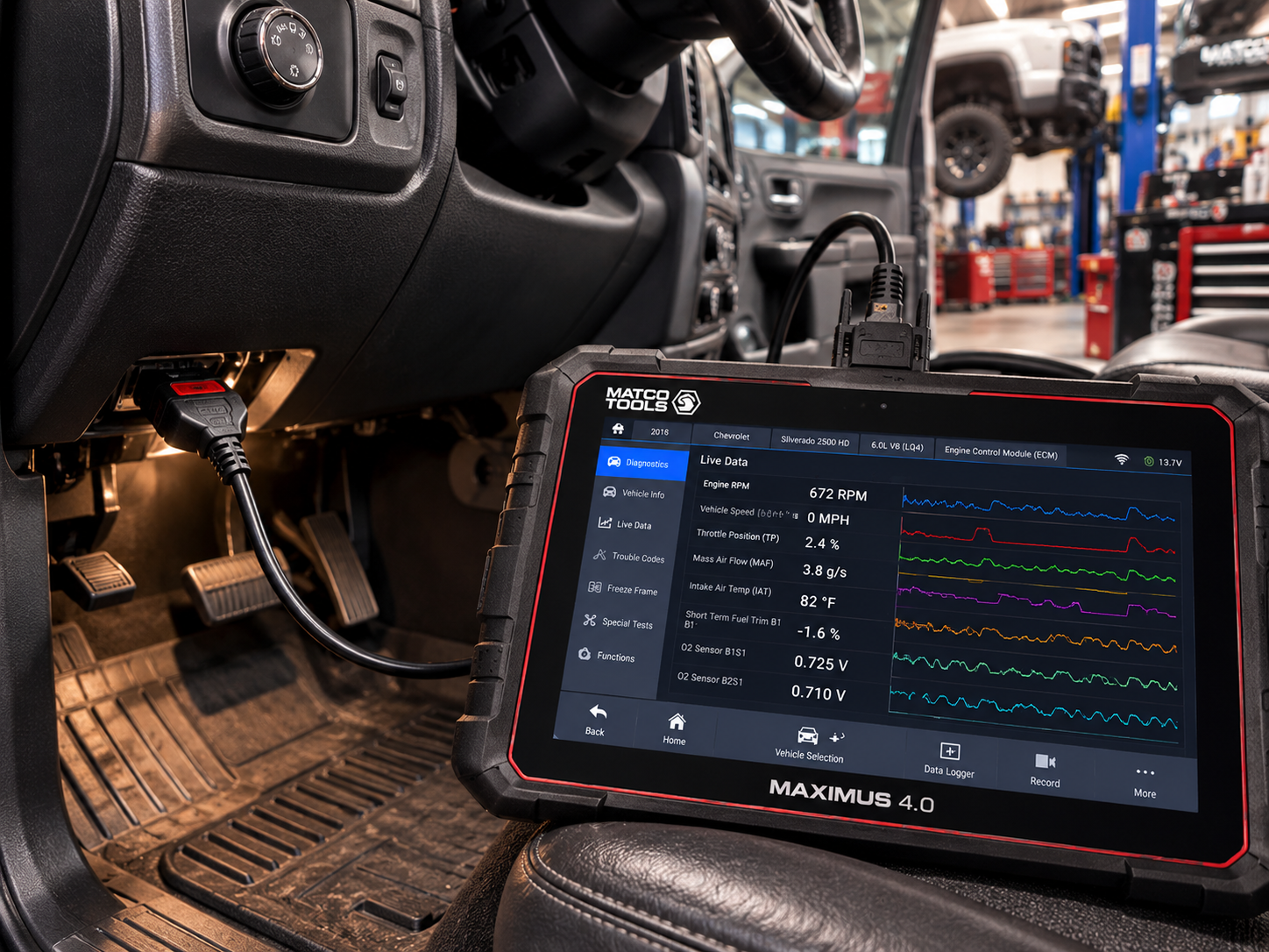Diagnostic scan tool plugged into OBD-II port reading live O2 sensor data and trouble codes inside vehicle