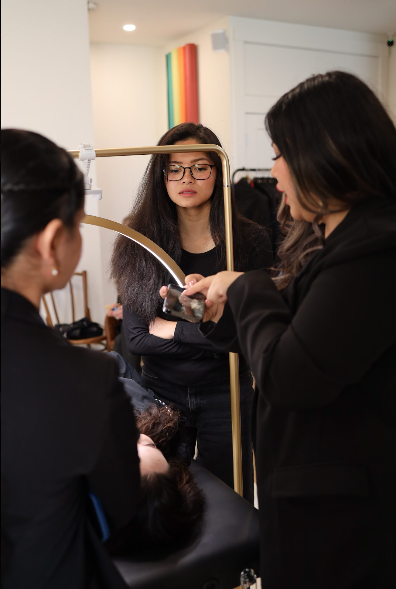 Close-up student guidance during aesthetic procedure
