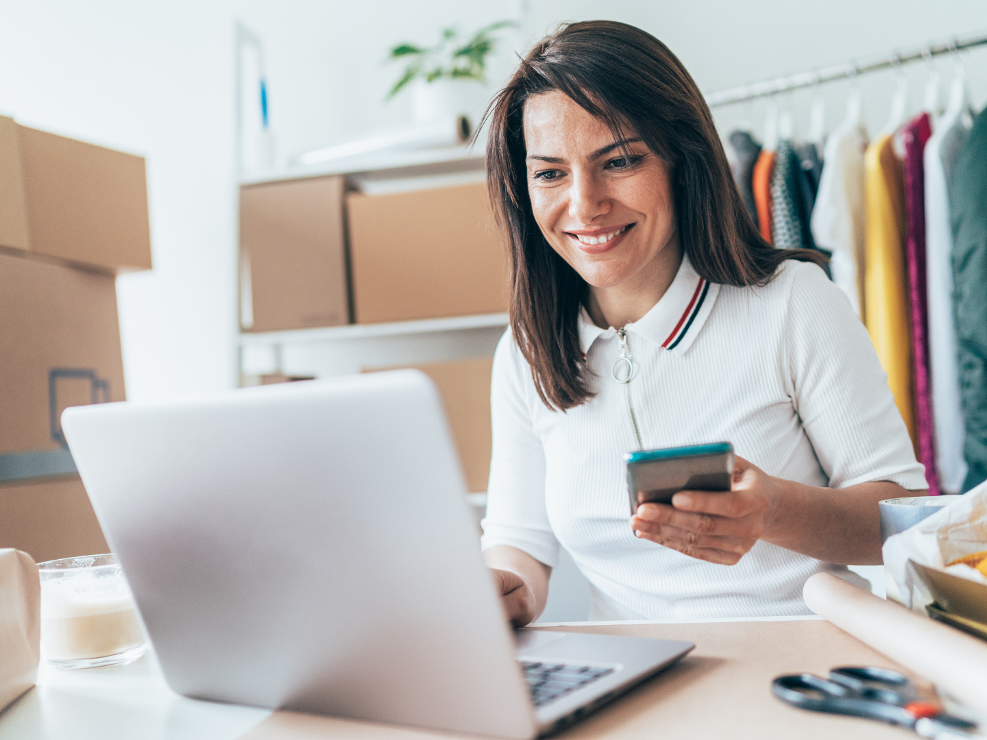A business owner reviewing a clear pricing statement at the counter