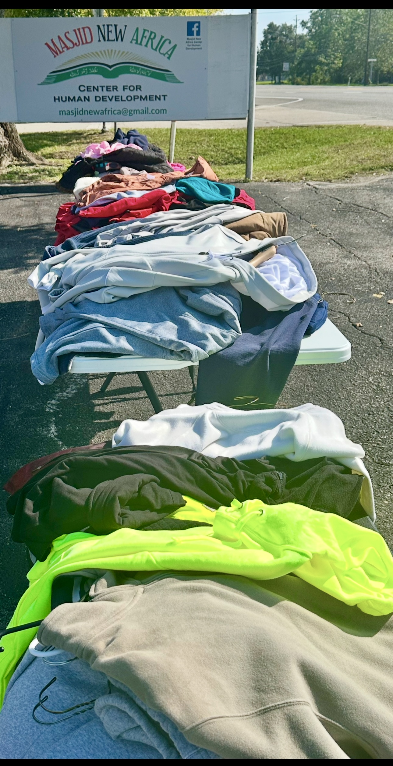 Masjid New Africa community clothing drive and charity outreach table
