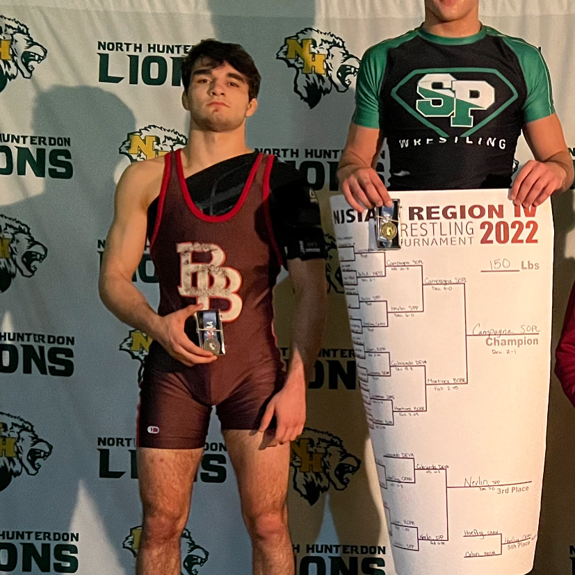 Este Built wrestlers posing after a tournament