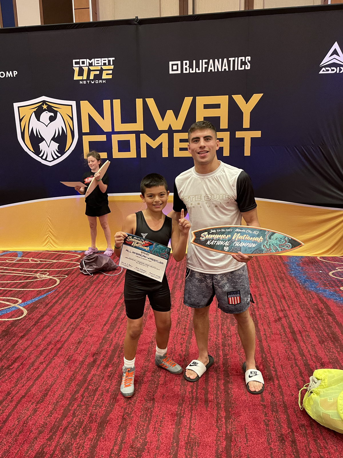 Este Built wrestler with a championship bracket