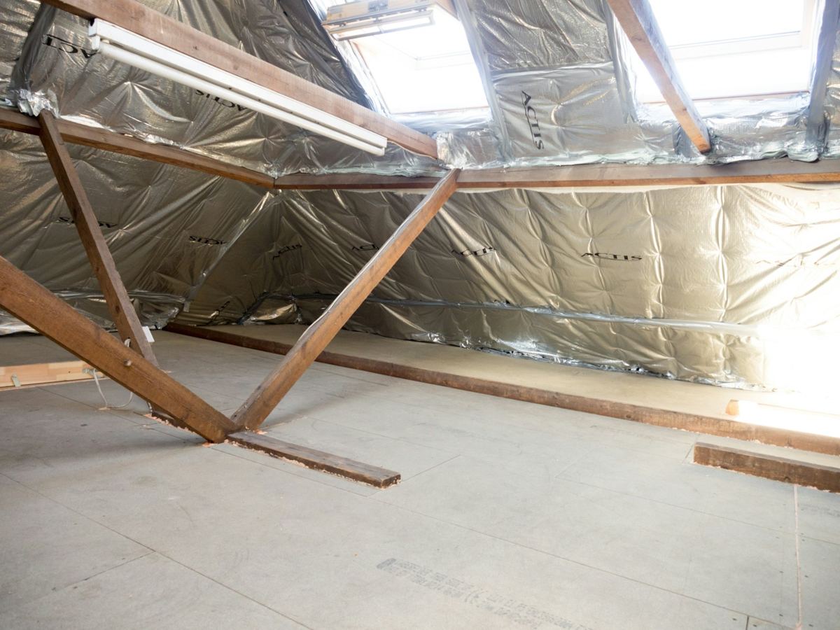 A loft lit by strip lighting
