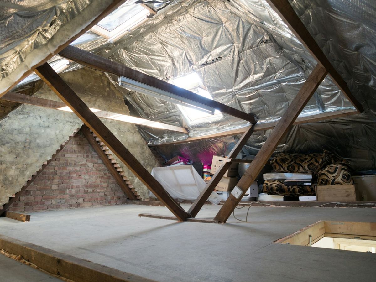 A loft with insulation and storage