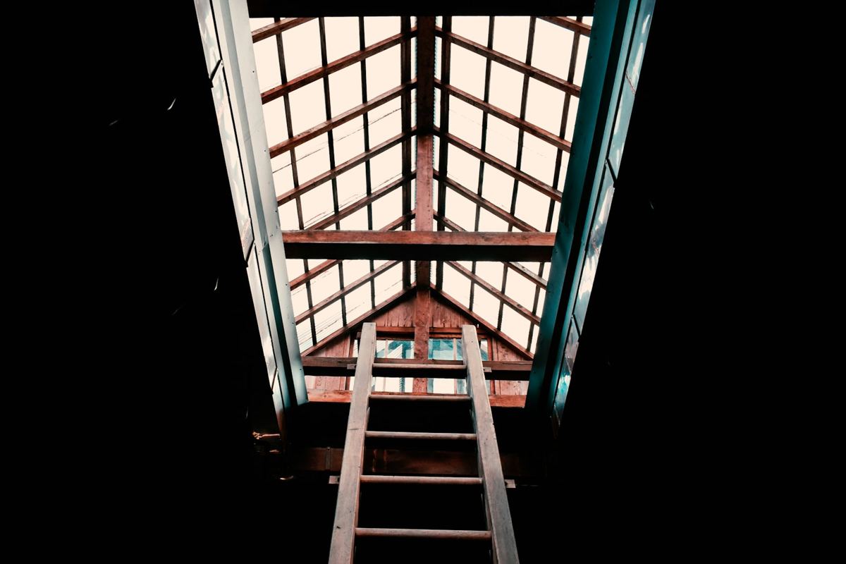 A ladder leading up into a loft