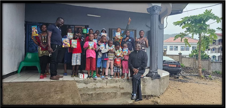 Catholic mission outreach with children and priest holding Catholic books in Cameroon