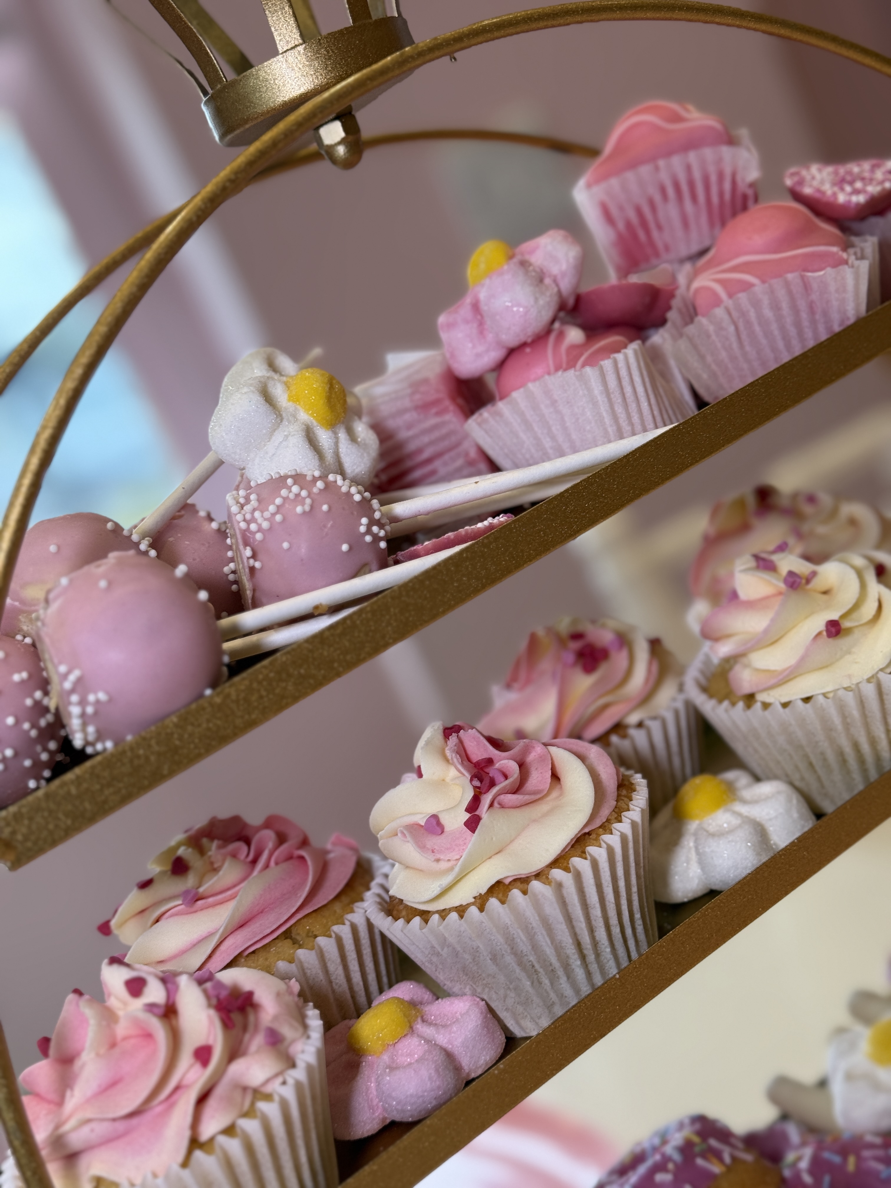 Swirl cupcakes, donuts and cake pops styled to match your party theme