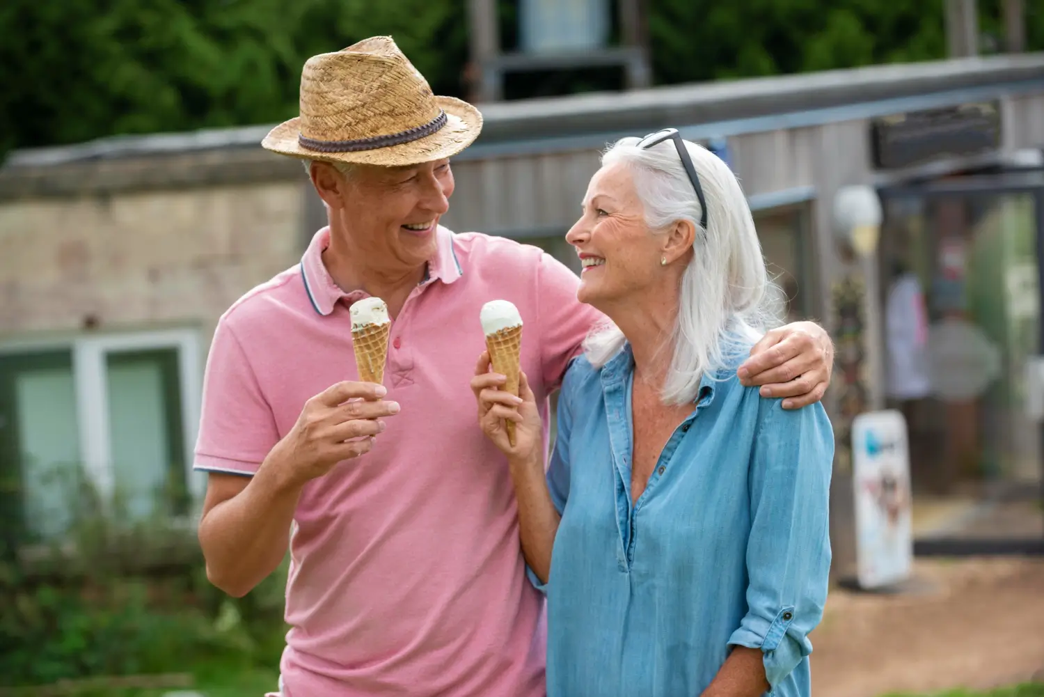 Residents enjoying an ice cream and sunny day outdoors