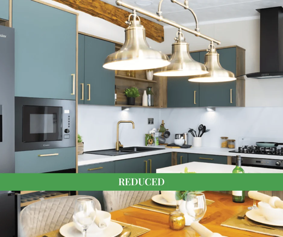 Luxury open-plan kitchen and dining area with feature pendant lighting