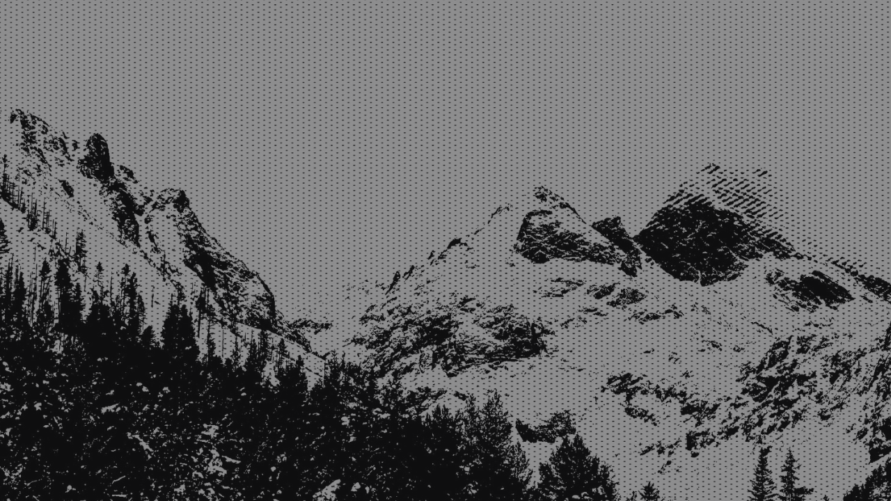 Cinematic black-and-white mountain range