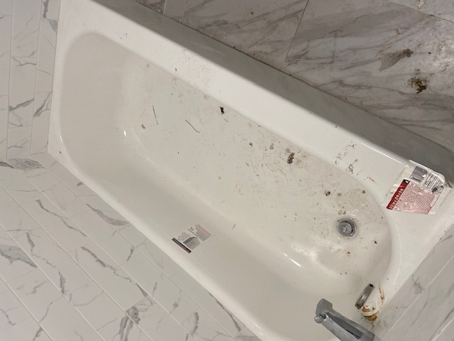 Post-Construction Soaking Tub & Tile Grout Debris Removal