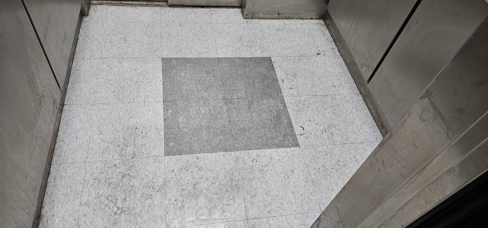Elevator Landing & VCT Pattern Tile Stripping & Wax