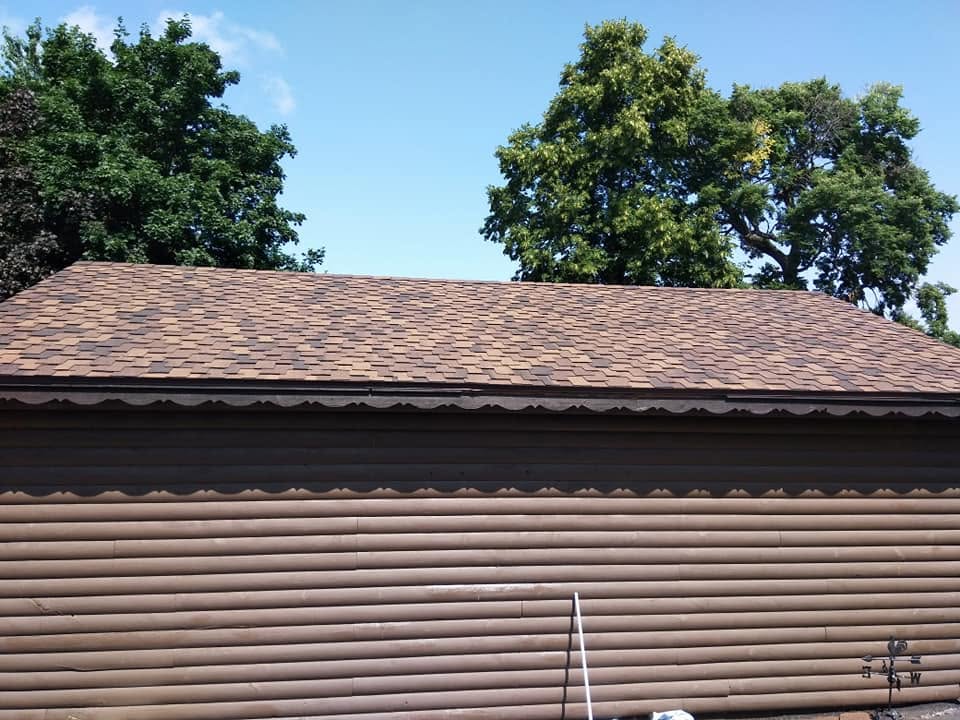 Heavy Weather Log Home Reroofing