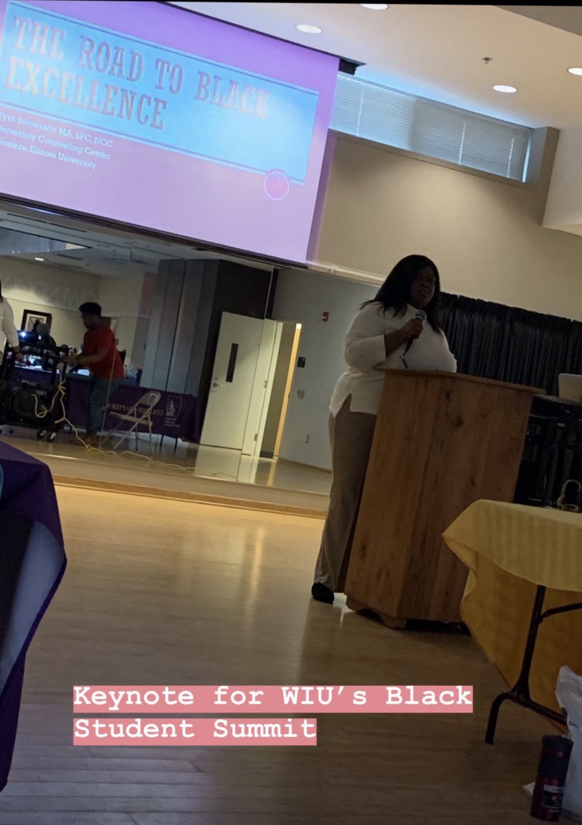 Tyra Steverson, LCPC, LPC, delivering a keynote address to a university audience.
